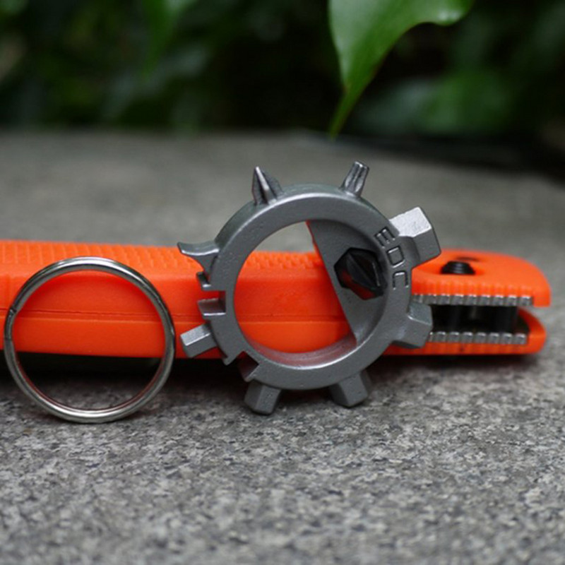 Mini Multi Tool 12 Functions Gear Nerūsējošā tērauda velosipēdu remonta rīki Skrūvgriezis Atslēgu piekariņš Pudeļu attaisāmais Pārnēsājams