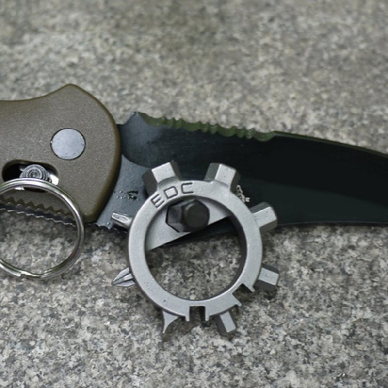 Mini Multi Tool 12 Functions Gear Nerūsējošā tērauda velosipēdu remonta rīki Skrūvgriezis Atslēgu piekariņš Pudeļu attaisāmais Pārnēsājams