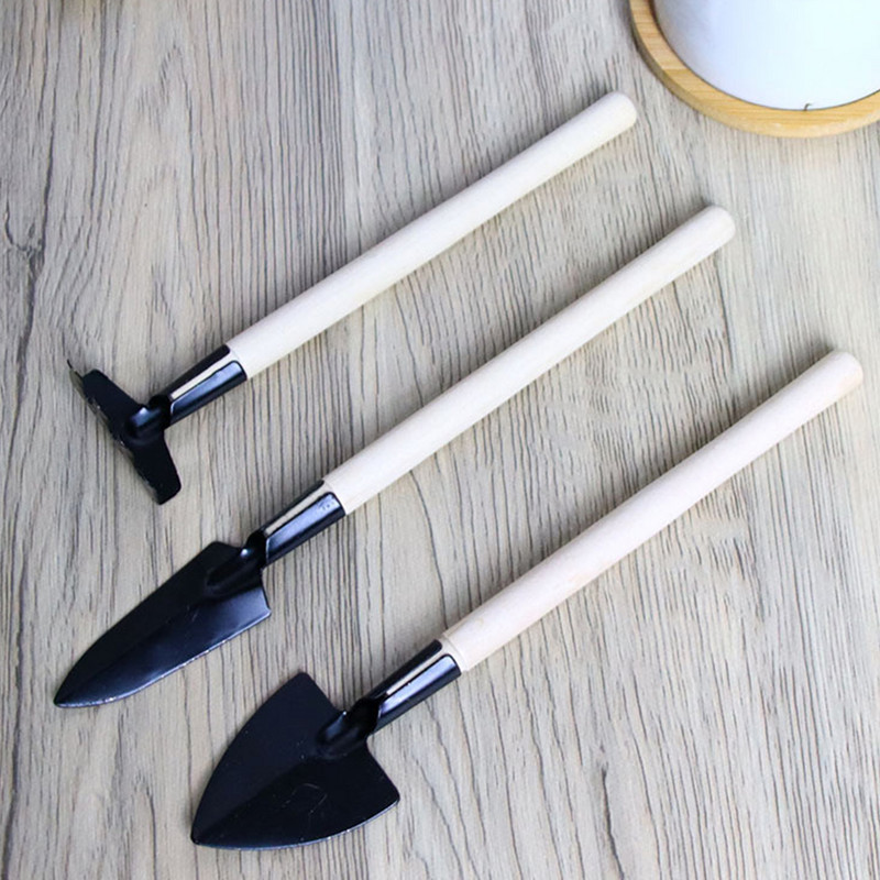 Dārza instrumenti Koka rokturis Mini dārzkopības komplekts Stādīšanas komplekts Grābeklis Daudzfunkcionāla mājsaimniecības māja