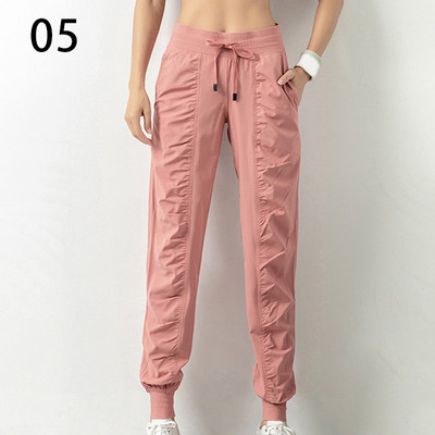 Trenerke Sportske trkačke hlače s vezicom za trčanje Ženske brzosušeće sportske hlače za fitnes s dva bočna džepa Hlače za vježbanje