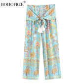 Vintage Chic bikses ar ziedu apdruku Boho bikses viskozes kokvilnas pušķi Brīvas platas kājas Bohēmijas bikses Summer Beach Pantalones