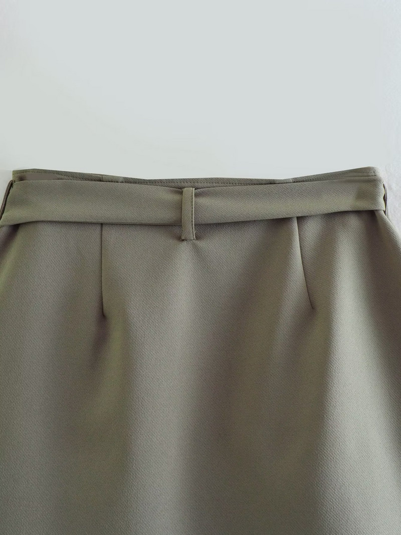 Sievietēm pavasara mini svārki ar augstu vidukli ar lielu kabatu, dekorēti asimetriska dizaina Mujer