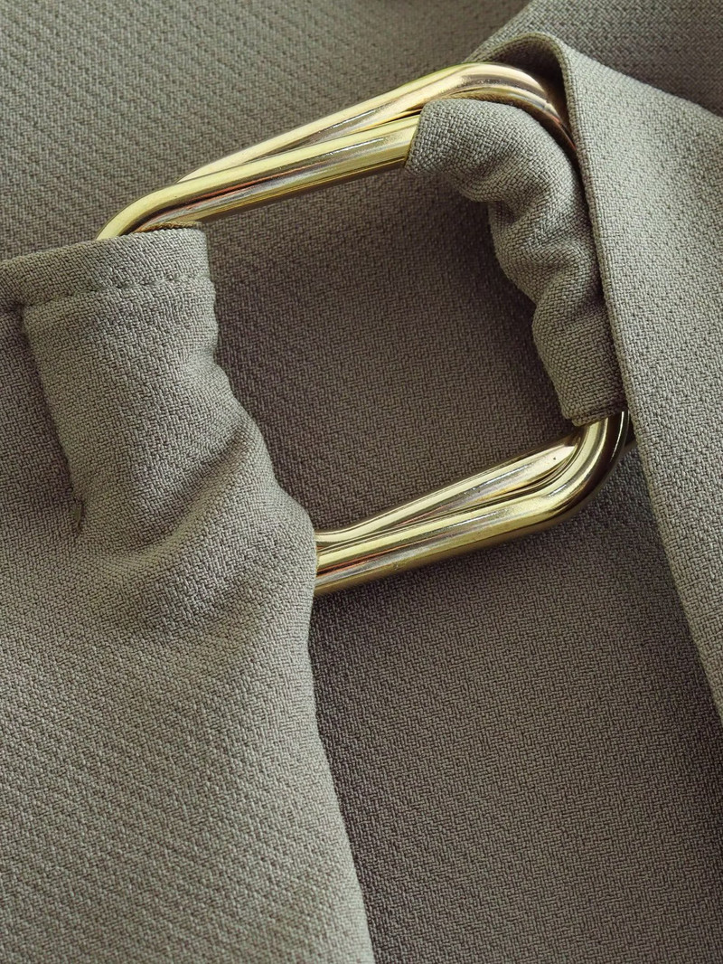 Sievietēm pavasara mini svārki ar augstu vidukli ar lielu kabatu, dekorēti asimetriska dizaina Mujer