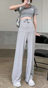 Pavasara jaunas, taisnas, modernas bikses, elpojošas plānas bikses grūtniecēm, valkājot brīvu ikdienas apģērbu