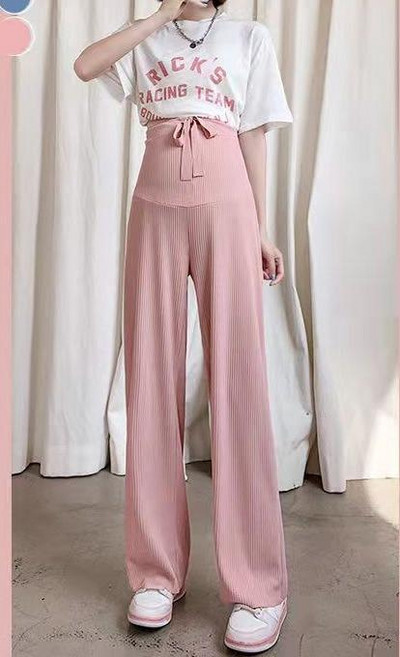 Pavasara jaunas, taisnas, modernas bikses, elpojošas plānas bikses grūtniecēm, valkājot brīvu ikdienas apģērbu