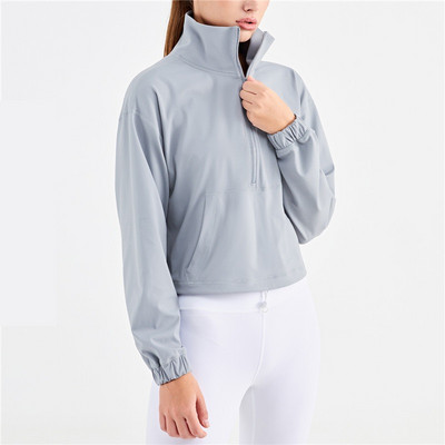 Fitness női sportdzseki felső magas gallérral félcipzáras laza zsebes, hosszú ujjú jóga póló edzőkabát Átfogó edzésfelső