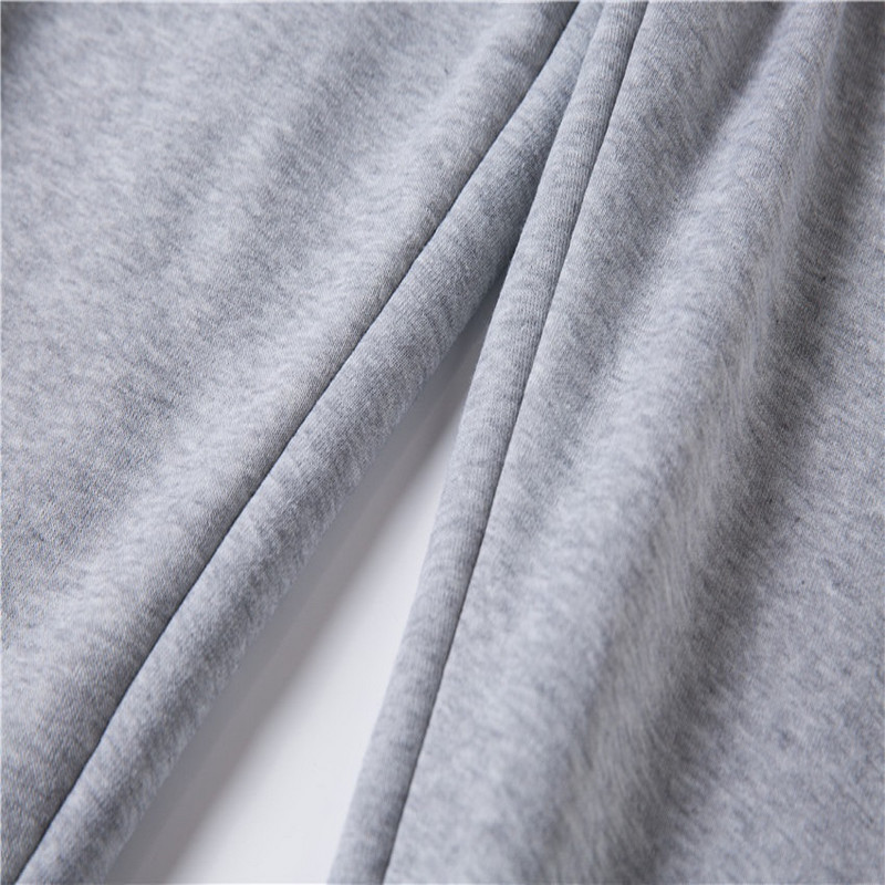 Brīvi skriešanas bikses, platas sievietes vīriešiem elastīgas jostasvietas sporta bikses ar apdrukām Bikses pārim atpūtai ielas apģērbs Unisex cietas sporta bikses