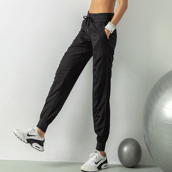 Тънък фитнес раздел Спортни панталони в едър план Дамски широки панталони за бягане Танцови практики Есенни бързосъхнещи панталони Йога