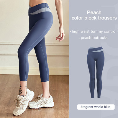 Aukšto juosmens klubus pakeliančios jogos kelnės Moteriškos kūno rengybos blauzdinės treniruotės Bėgimo pėdkelnės Greitai džiūstančios sportinės kelnės Elastinės pilvo kelnės