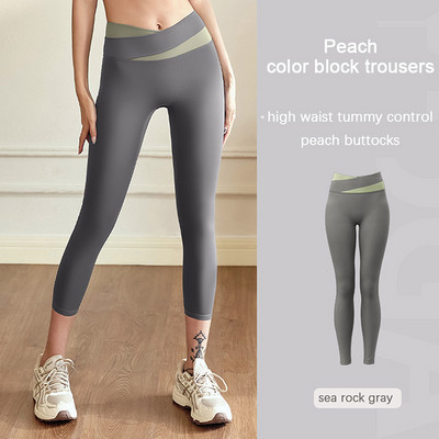 Aukšto juosmens klubus pakeliančios jogos kelnės Moteriškos kūno rengybos blauzdinės treniruotės Bėgimo pėdkelnės Greitai džiūstančios sportinės kelnės Elastinės pilvo kelnės