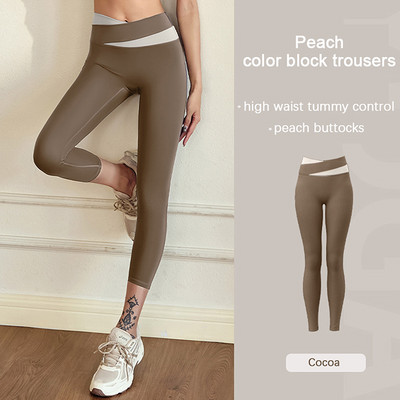 Aukšto juosmens klubus pakeliančios jogos kelnės Moteriškos kūno rengybos blauzdinės treniruotės Bėgimo pėdkelnės Greitai džiūstančios sportinės kelnės Elastinės pilvo kelnės