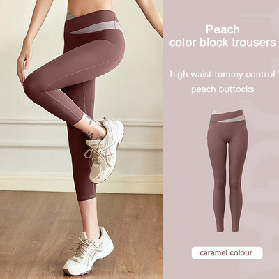 Aukšto juosmens klubus pakeliančios jogos kelnės Moteriškos kūno rengybos blauzdinės treniruotės Bėgimo pėdkelnės Greitai džiūstančios sportinės kelnės Elastinės pilvo kelnės