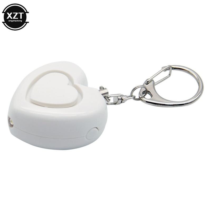 Pārnēsājamas avārijas meitenes sieviešu drošības signalizācijas pašaizsardzības 130 DB decibeli ar LED gaismu drošības atslēgu ķēdes pedants pretvilku