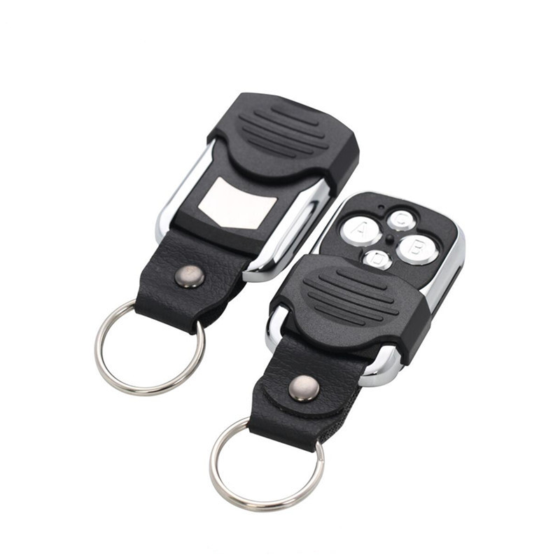 Tasuta kohaletoimetamine 433MHZ kloonpaljundaja võti fikseeritud õppekood Kloonimise võtmehoidja kaugus juhtmevaba kaugjuhtimispult garaažiuksele