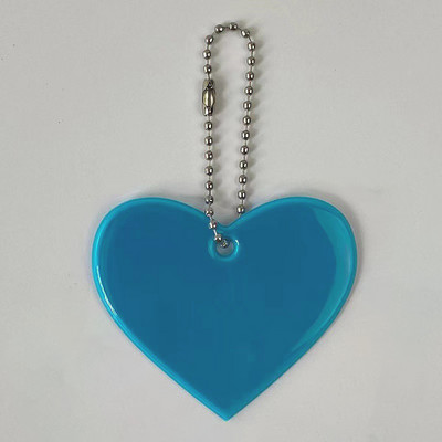 Sirds formas atstarojošs kulons atslēgu piekariņu somas Aksesuāri labi pamanāmi PVC atstarotāji atslēgu piekari Mugursomas dāmām bērnu drošība