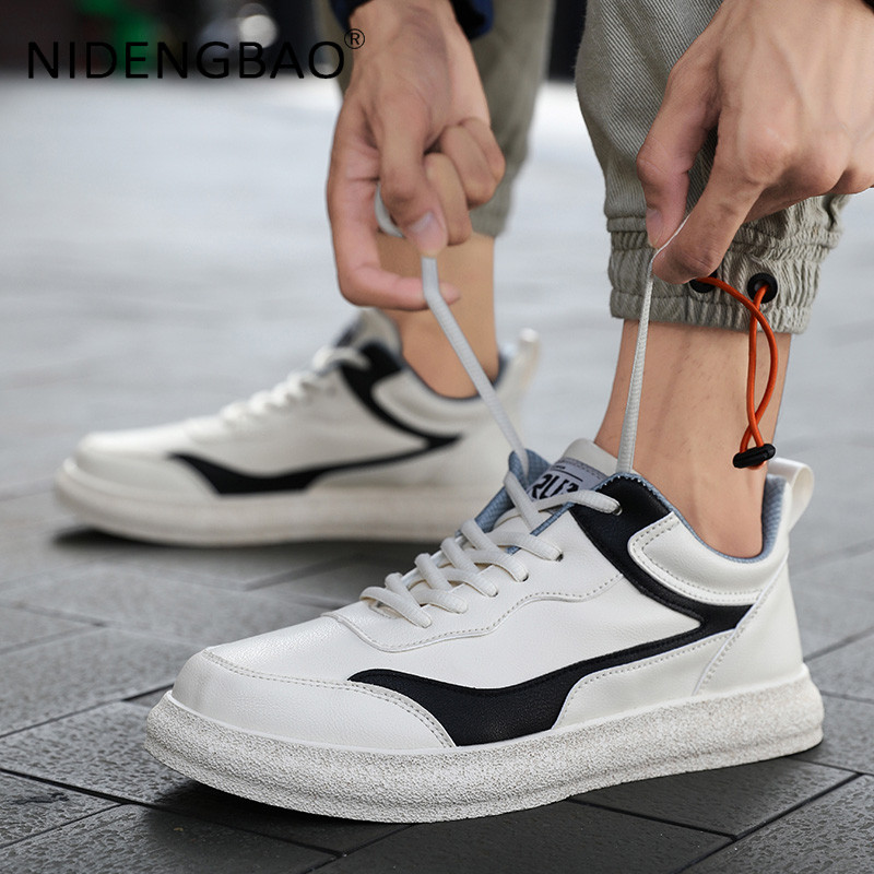 Vyriški sportiniai bateliai riedlenčių sportui iš poliuretano odos vyriški vaikščiojimo lauke laisvalaikio sportiniai batai suvarstoma plokščia avalynė Zapatillas de Hombre