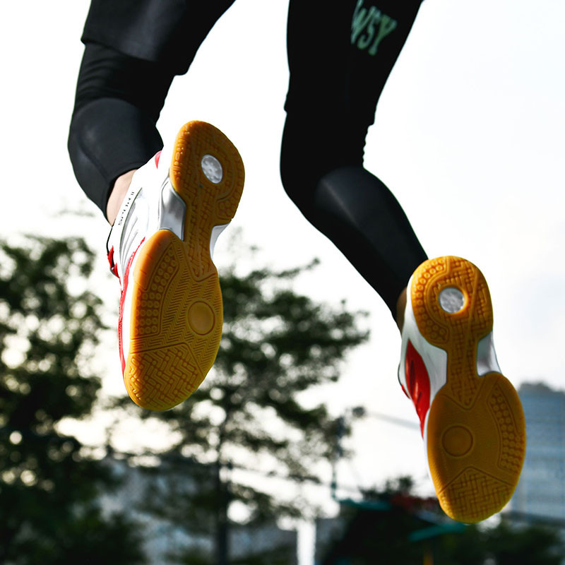 Synthese Mesh Meeste hingavad libisemisvastased lööki summutavad sulgpallispordijalatsid Professionaalsed võrkpalli tennise treeningtossud