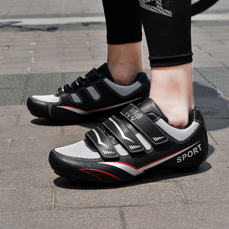 Vasaras vīriešu sieviešu āra āķa cilpa, pašfiksējoši šosejas velosipēdistu apavi Elpojoši profesionāli riteņbraukšanas treniņi unisex kedas