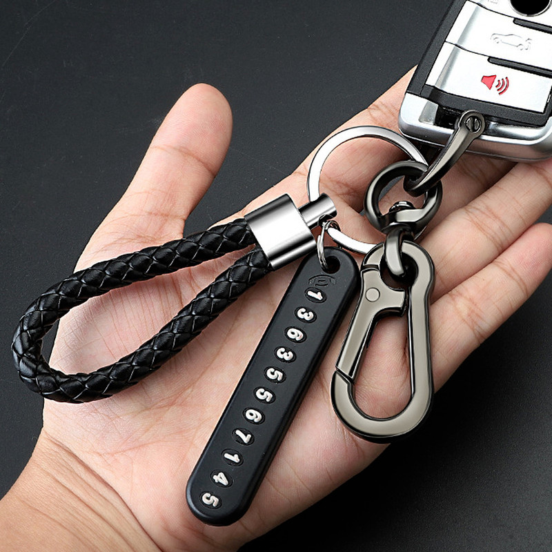 Pretpazaudēts automašīnas atslēgu piekariņš Tālruņa numura karte atslēgu piekariņš Ādas pinuma virve Automašīnas atslēgu piekariņu turētājs āra kāpšanas piederumi