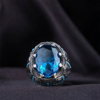 Ευρωπαϊκό και αμερικανικό διαμαντένιο μπλε ζιργκόν δαχτυλίδι Hyland Gem ρετρό ανδρικό δαχτυλίδι υψηλής ποιότητας τιρκουάζ για να παρακολουθήσετε το δαχτυλίδι του συμποσίου