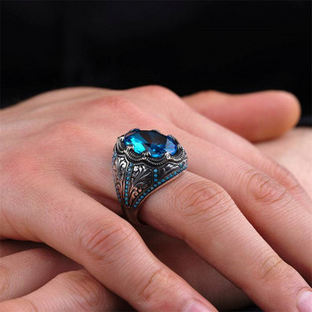 Ευρωπαϊκό και αμερικανικό διαμαντένιο μπλε ζιργκόν δαχτυλίδι Hyland Gem ρετρό ανδρικό δαχτυλίδι υψηλής ποιότητας τιρκουάζ για να παρακολουθήσετε το δαχτυλίδι του συμποσίου