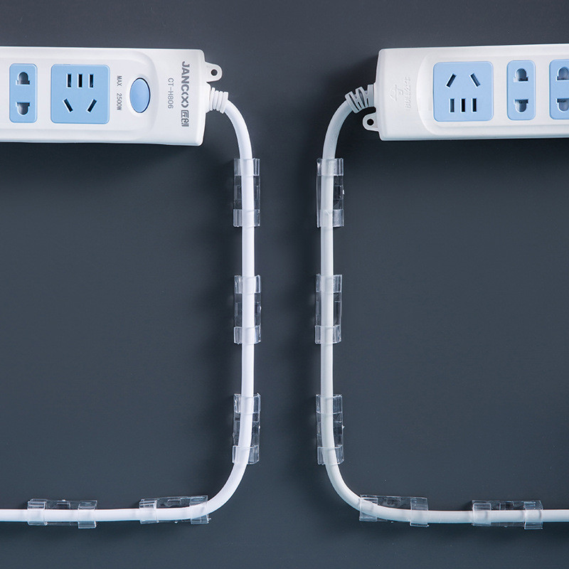 20 gab. Pašlīmējošie kabeļu skavas Mājas biroja galddatora organizators Vadu pārvaldnieks Vada turētājs Kabeļa skava austiņu līnijas uztīšanas fiksators