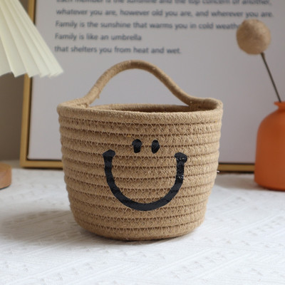 Ar rokām austs uzglabāšanas grozs Mīlīgs smaidiņš pie sienas piekarināmi grozi Kosmētikas rotaļlietas Dažādi piederumi Organizators Kokvilnas virve galda uzkodu trauks