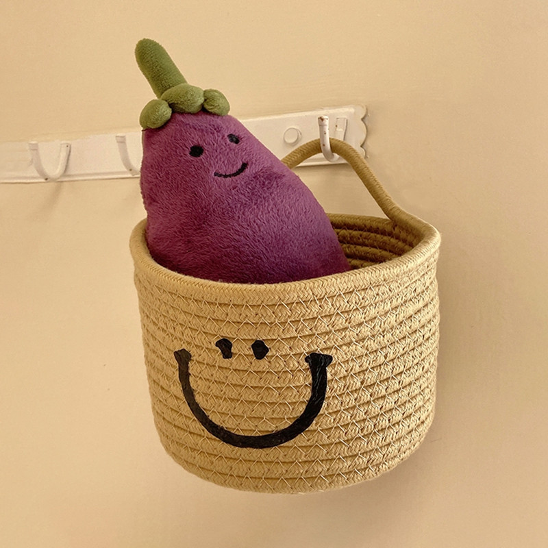 Ar rokām austs uzglabāšanas grozs Mīlīgs smaidiņš pie sienas piekarināmi grozi Kosmētikas rotaļlietas Dažādi piederumi Organizators Kokvilnas virve galda uzkodu trauks