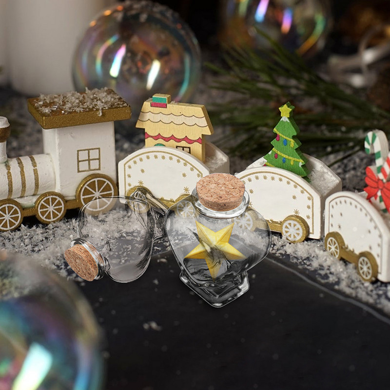 Radoša caurspīdīga stikla pudele ar korķa aizbāzni, ideāli piemērota DIY un dekorēšanai. Lieliska dāvana draugiem un ģimenei