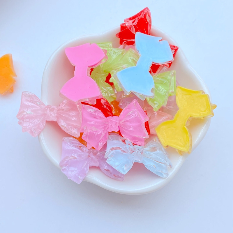 10 gab. Jauns Mini Cute, 19*29 mm želejveida loku sērija, plakana aizmugure, sveķu kabošoni.