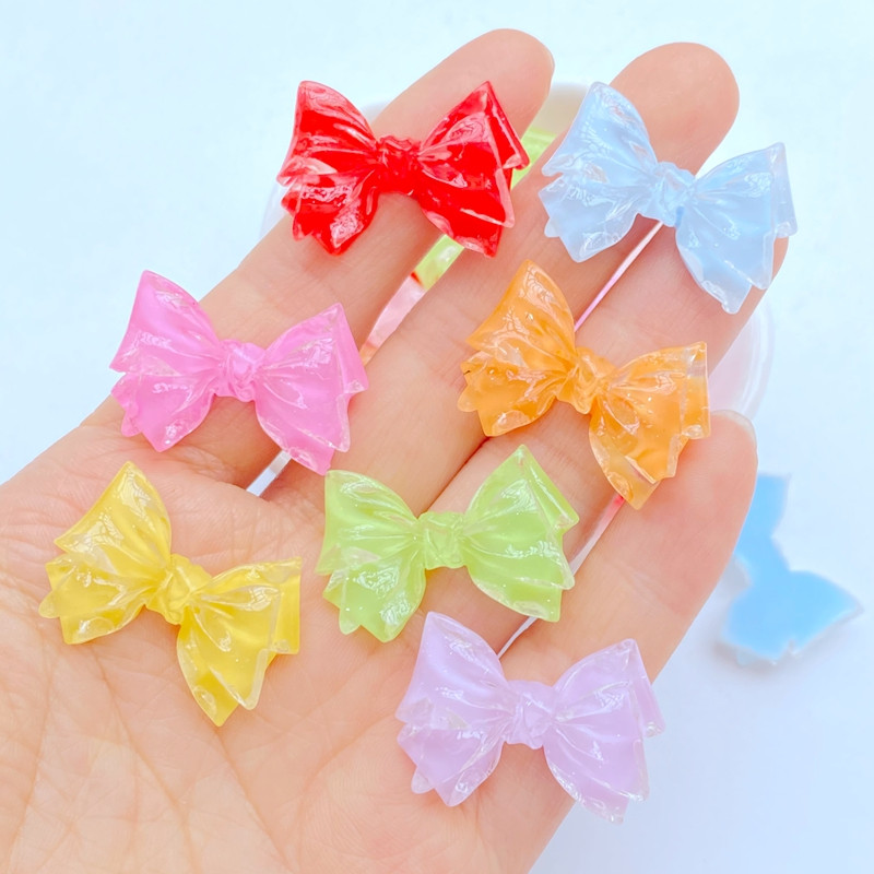 10 gab. Jauns Mini Cute, 19*29 mm želejveida loku sērija, plakana aizmugure, sveķu kabošoni.