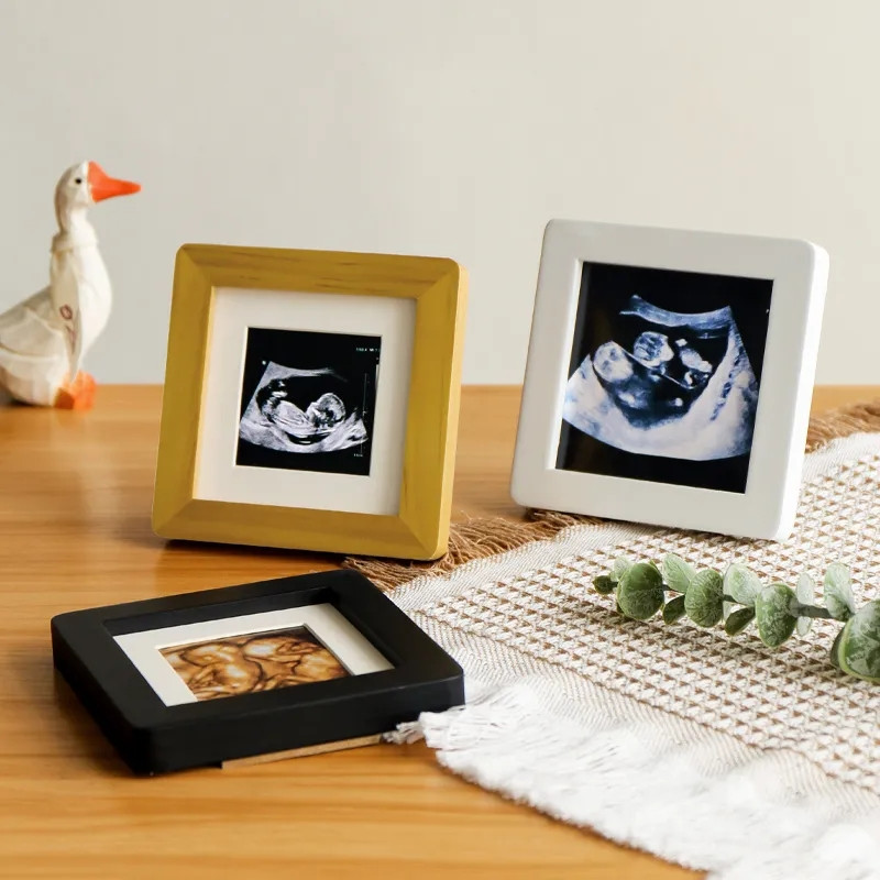 Četru dimensiju krāsu ultraskaņas attēls ar mazuļa masīvkoka biroja darbvirsmas mazu fotoattēlu rāmi, bērna augšanas rekorda foto rāmis