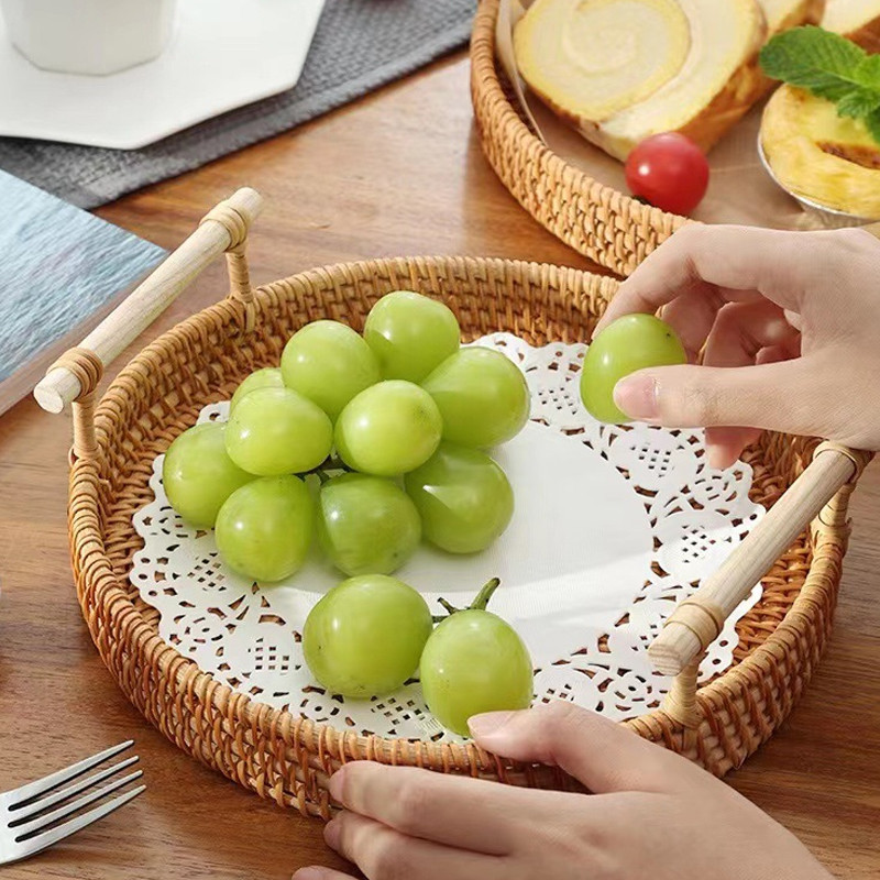 Apaļi pārtikas uzglabāšanas šķīvji, ar rokām austi rotangpalmas uzglabāšanas paplāte ar koka rokturi, pīts mājas augļu paplāte Augļu kūkas pārtikas šķīvis