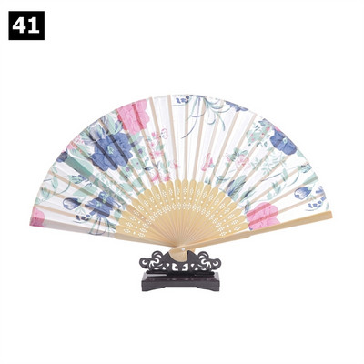 Vintage saliekamais ventilators ķīniešu klasiskais roku ventilators kāzu deju ballītes dekorēšanai. Ornaments japāņu mājas dekors