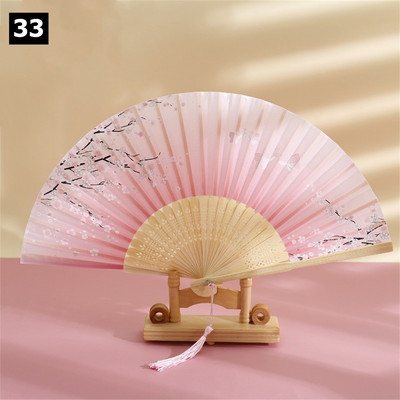 Vintage saliekamais ventilators ķīniešu klasiskais roku ventilators kāzu deju ballītes dekorēšanai. Ornaments japāņu mājas dekors