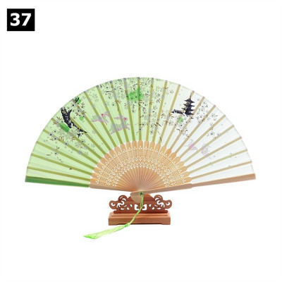 Vintage saliekamais ventilators ķīniešu klasiskais roku ventilators kāzu deju ballītes dekorēšanai. Ornaments japāņu mājas dekors