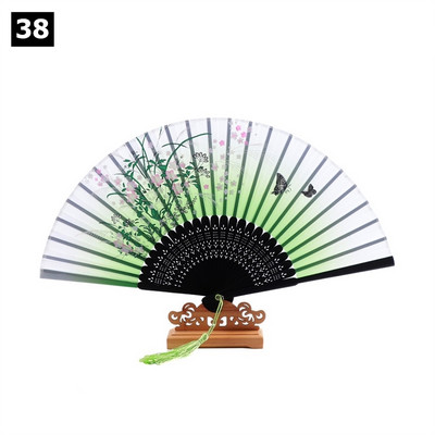 Vintage saliekamais ventilators ķīniešu klasiskais roku ventilators kāzu deju ballītes dekorēšanai. Ornaments japāņu mājas dekors