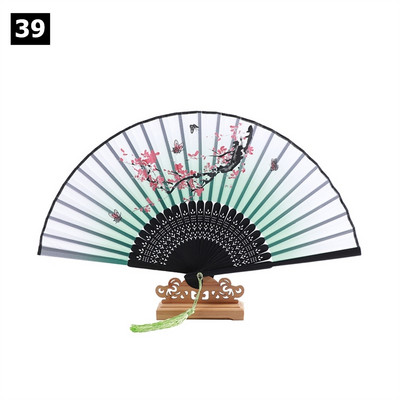 Vintage saliekamais ventilators ķīniešu klasiskais roku ventilators kāzu deju ballītes dekorēšanai. Ornaments japāņu mājas dekors