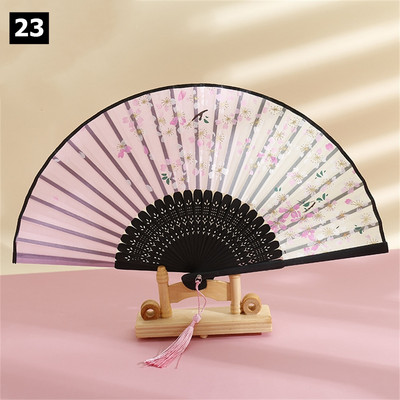 Vintage saliekamais ventilators ķīniešu klasiskais roku ventilators kāzu deju ballītes dekorēšanai. Ornaments japāņu mājas dekors