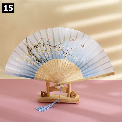 Vintage saliekamais ventilators ķīniešu klasiskais roku ventilators kāzu deju ballītes dekorēšanai. Ornaments japāņu mājas dekors