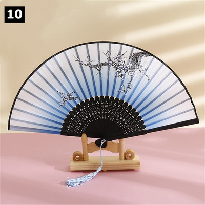 Vintage saliekamais ventilators ķīniešu klasiskais roku ventilators kāzu deju ballītes dekorēšanai. Ornaments japāņu mājas dekors