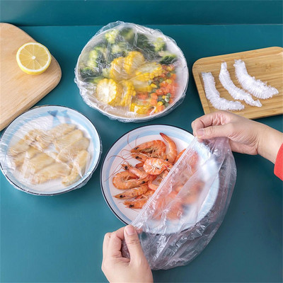 100 gab vienreizējās lietošanas bļodas pārsegs Elastīgs pārtikas putekļu vāks Plastmasas iesaiņojuma pārsegs svaigas pārtikas uzglabāšanai Saran Wrap ledusskapja virtuvei