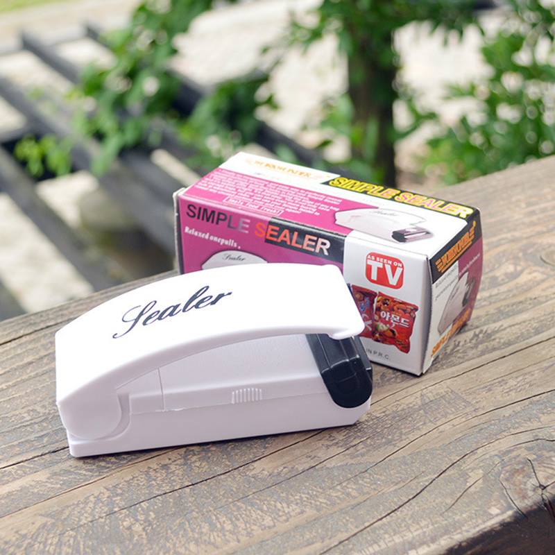 Преносим термоуплътнител Електрическа домакинска ръчна преса Уплътнител за храна Машина за опаковане на пластмасови торбички с магнитна основа Организиране