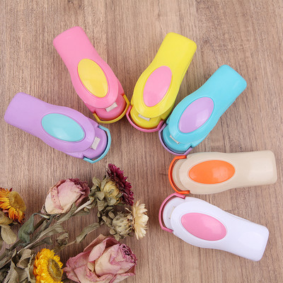 Преносима мини машина за топлинно запечатване Опаковка Домакински инструменти Ръчен уплътнител Храна Уплътнител Топлозапечатване Опаковка Уплътнител за пластмасови торбички