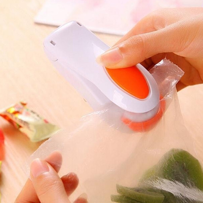 Преносима мини машина за топлинно запечатване Опаковка Домакински инструменти Ръчен уплътнител Храна Уплътнител Топлозапечатване Опаковка Уплътнител за пластмасови торбички