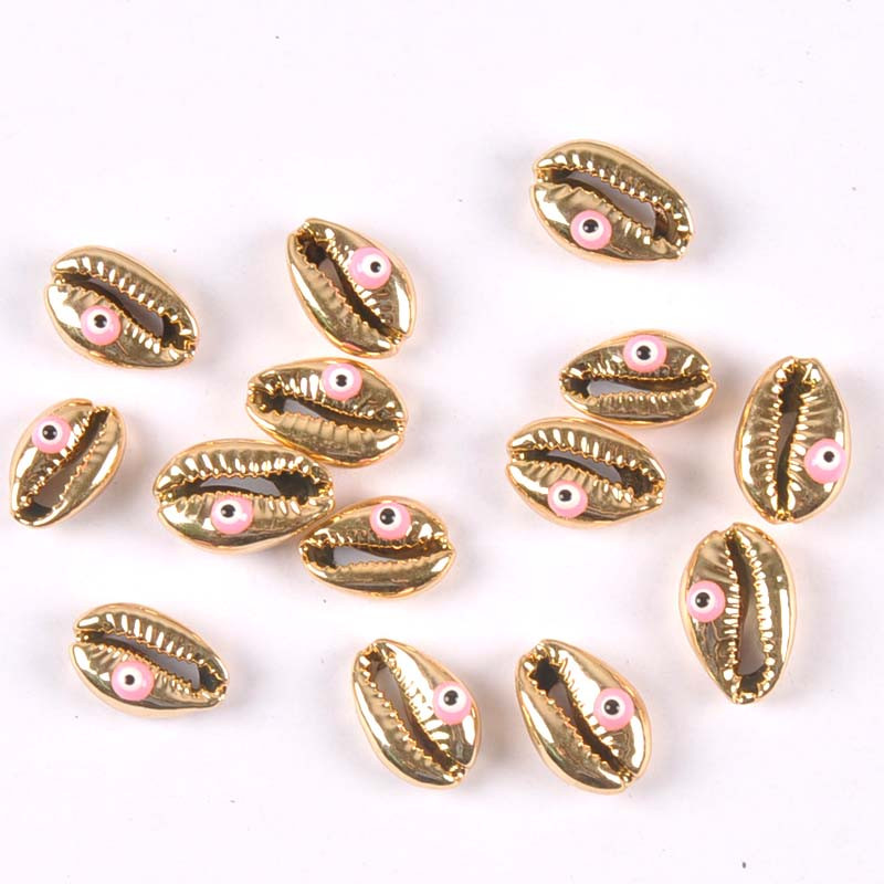 10 бр. Позлатени Evil Eyes Pattern Seashells Морски домашен декор Естествени черупки за бижута Гривна DIY Craft Scrapbook tr0358