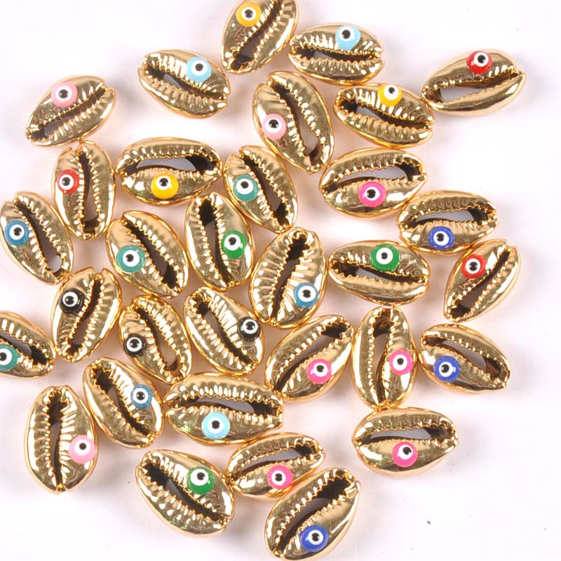 10 бр. Позлатени Evil Eyes Pattern Seashells Морски домашен декор Естествени черупки за бижута Гривна DIY Craft Scrapbook tr0358