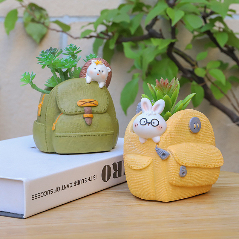 Iskolatáskák és állatok Ültetőgépek pozsgás növényekhez Virágcserepek Dekoratív díszek Tündérkerti figurák Otthoni asztaldísz