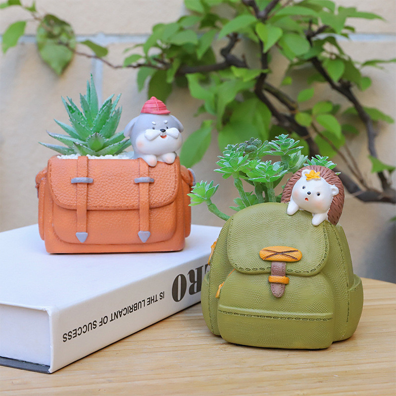 Iskolatáskák és állatok Ültetőgépek pozsgás növényekhez Virágcserepek Dekoratív díszek Tündérkerti figurák Otthoni asztaldísz