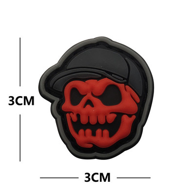 Taktiskā velna pļāvēja PVC plāksteri spīd tumšās gumijas atstarojošā militārā nozīmītē